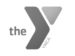 The YMCA logo featuring a stylized angled &quot;Y&quot; shape and the text &quot;the YMCA&quot;.